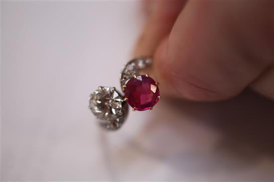 A gold, ruby and diamond crossover ring, size M.